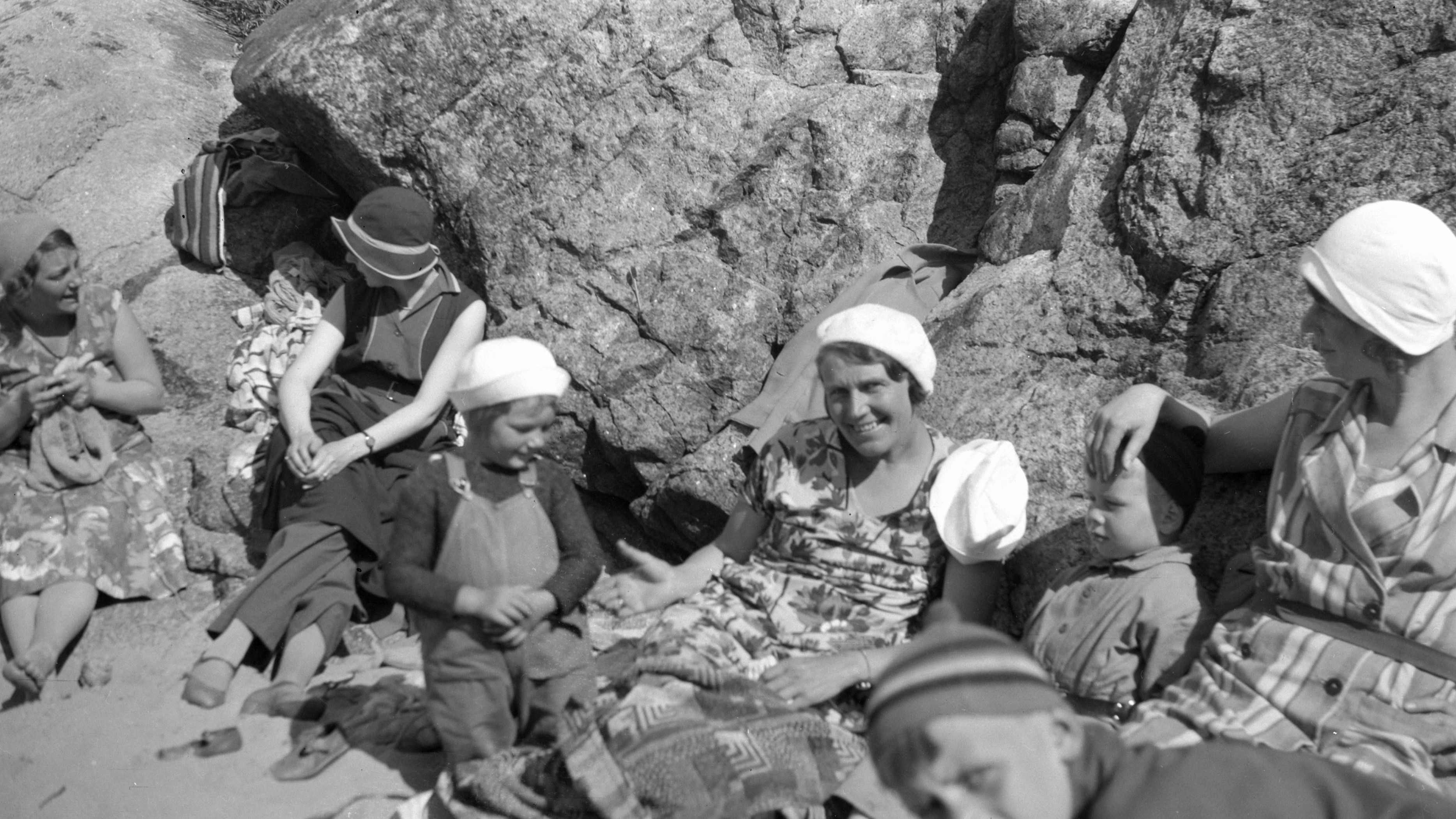 Ferierende på strand